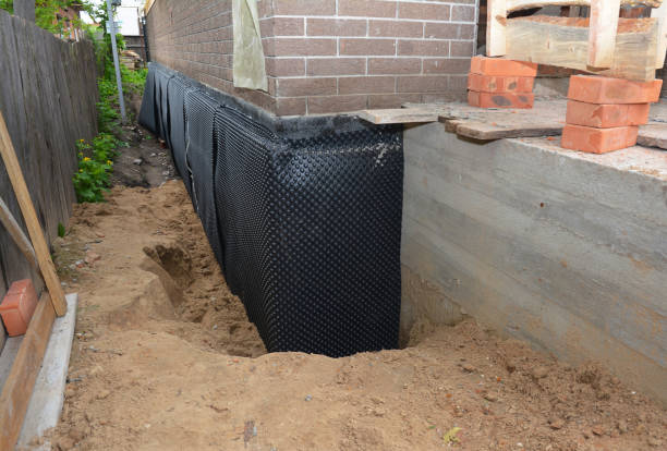 SJ Waterproofing Pros technician performing targeted Waterproofing assessment in Davidsonville, MD